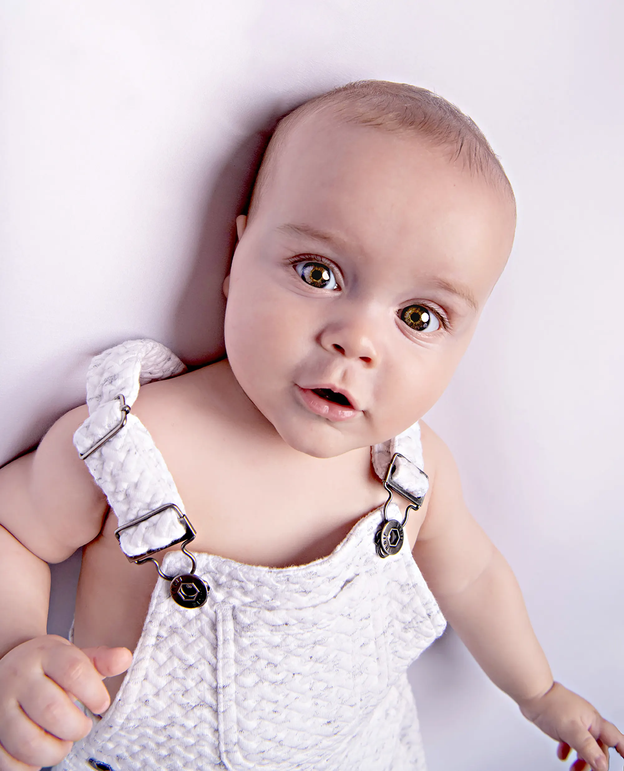 Joyful baby in a vibrant studio setup at Sky Portraits, Sydney - baby photography session