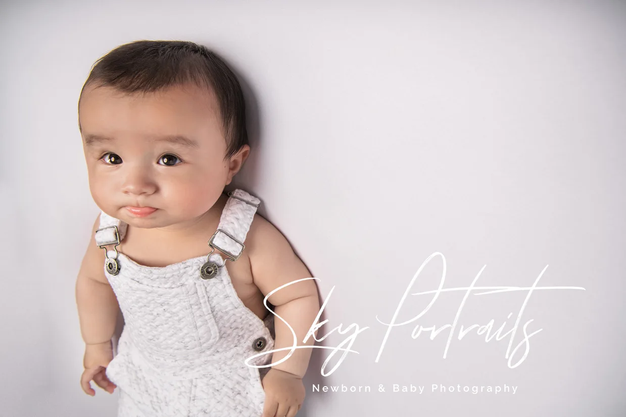 Playful newborn session with siblings at Sky Portraits Studio, North Shore, Sydney - family photography