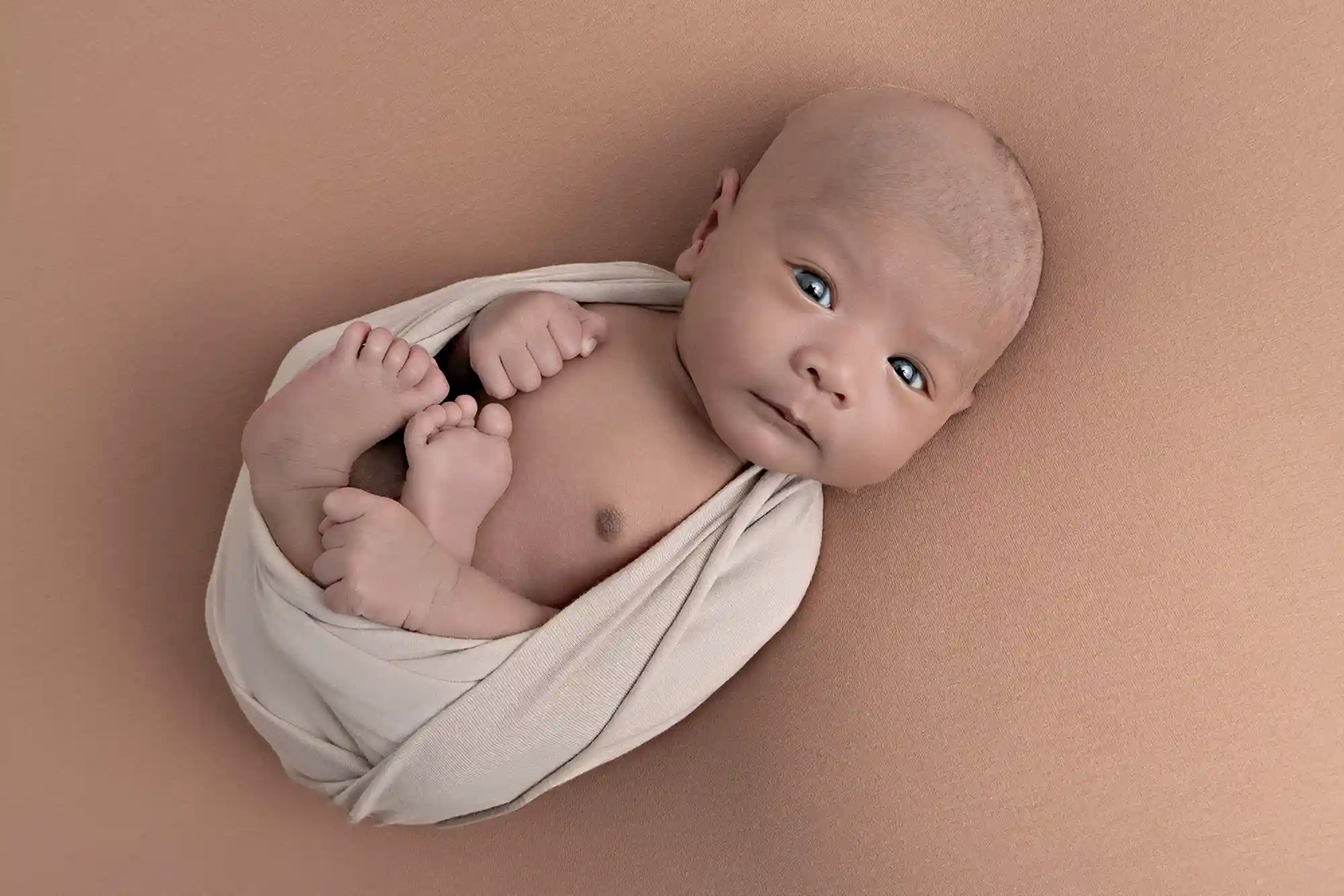 Cozy newborn session in basket at Sky Portraits, Sydney - creative newborn photography